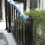Aluminum-Glass-Railing-During-InstallationProcess-infront-of-a-house-in-New-Market by Fence Direct